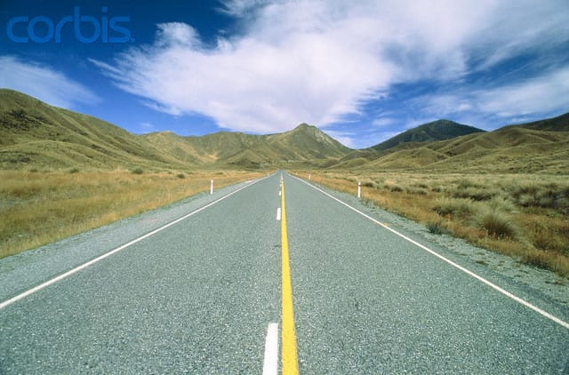 Dunedin, South Island, New Zealand --- Country road (Lindis pass) near Otago, New Zealand --- Image by © Eddi Boehnke/Corbis