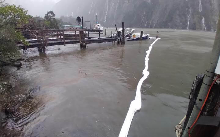 Oil From Submerged, Burnt Boat Leaking Into Milford Sound