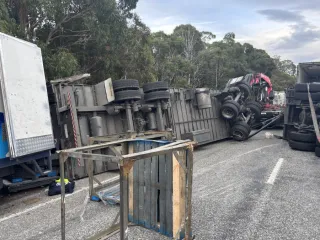SH8 Closed as Contractors Work to Clear Rolled Truck