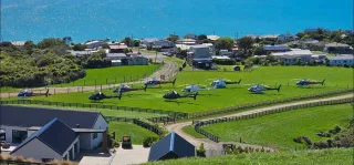 Nine helicopters bring 45 Australian visitors to Riverton.