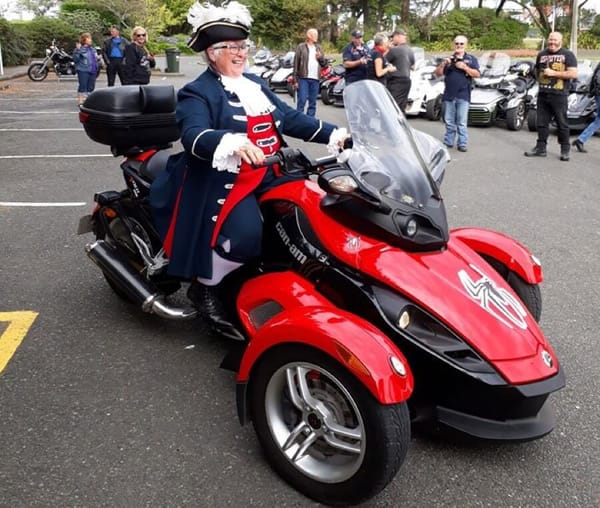 Town Crier Takes a Spyder For Some Laps