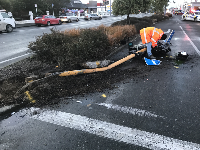 City Traffic Light Flattened After Two Car Crash