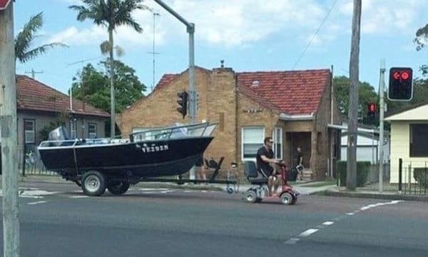 Aussie Man Caught Towing Boat Behind Mobility Scooter