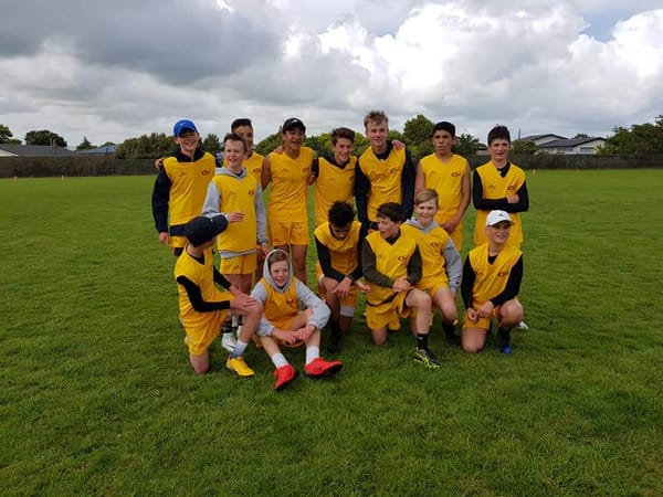 Southern Rivals Clash in Wild Touch Rugby Conditions